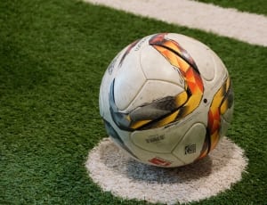 white yellow and red soccer ball thumbnail