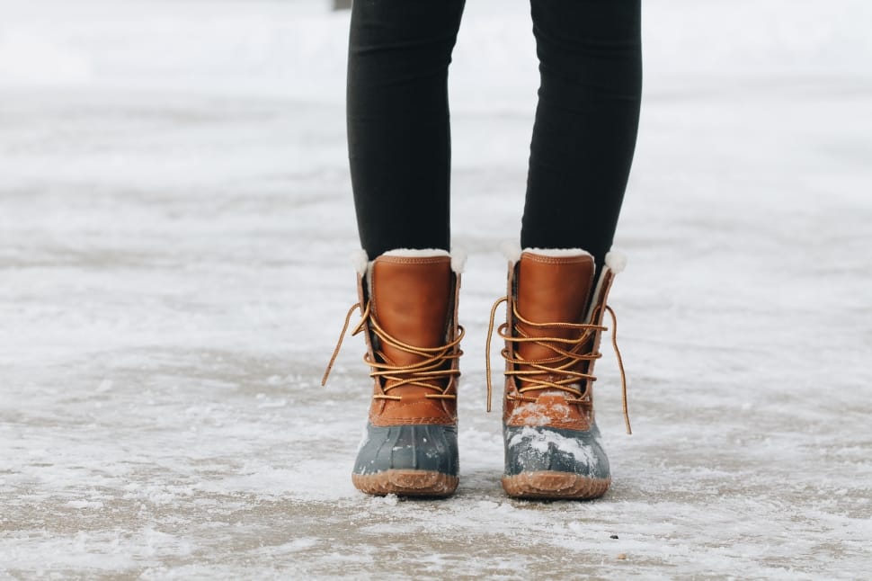 women's pair of brown winter boots preview