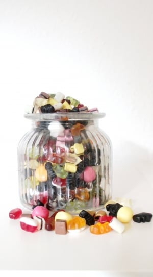 candies in clear glass jar thumbnail