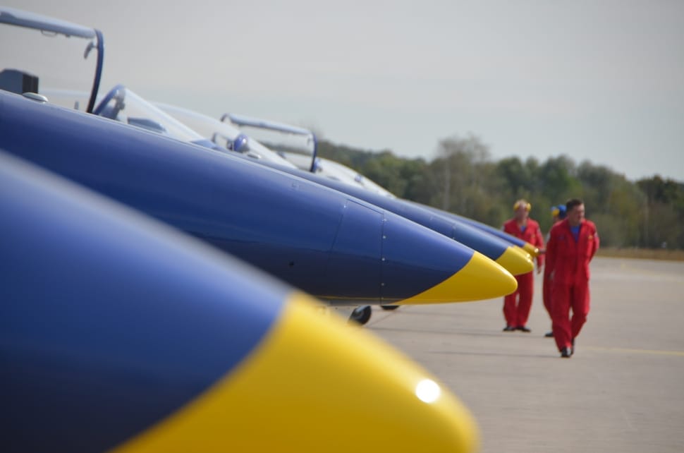 blue yellow fighter jets in row preview
