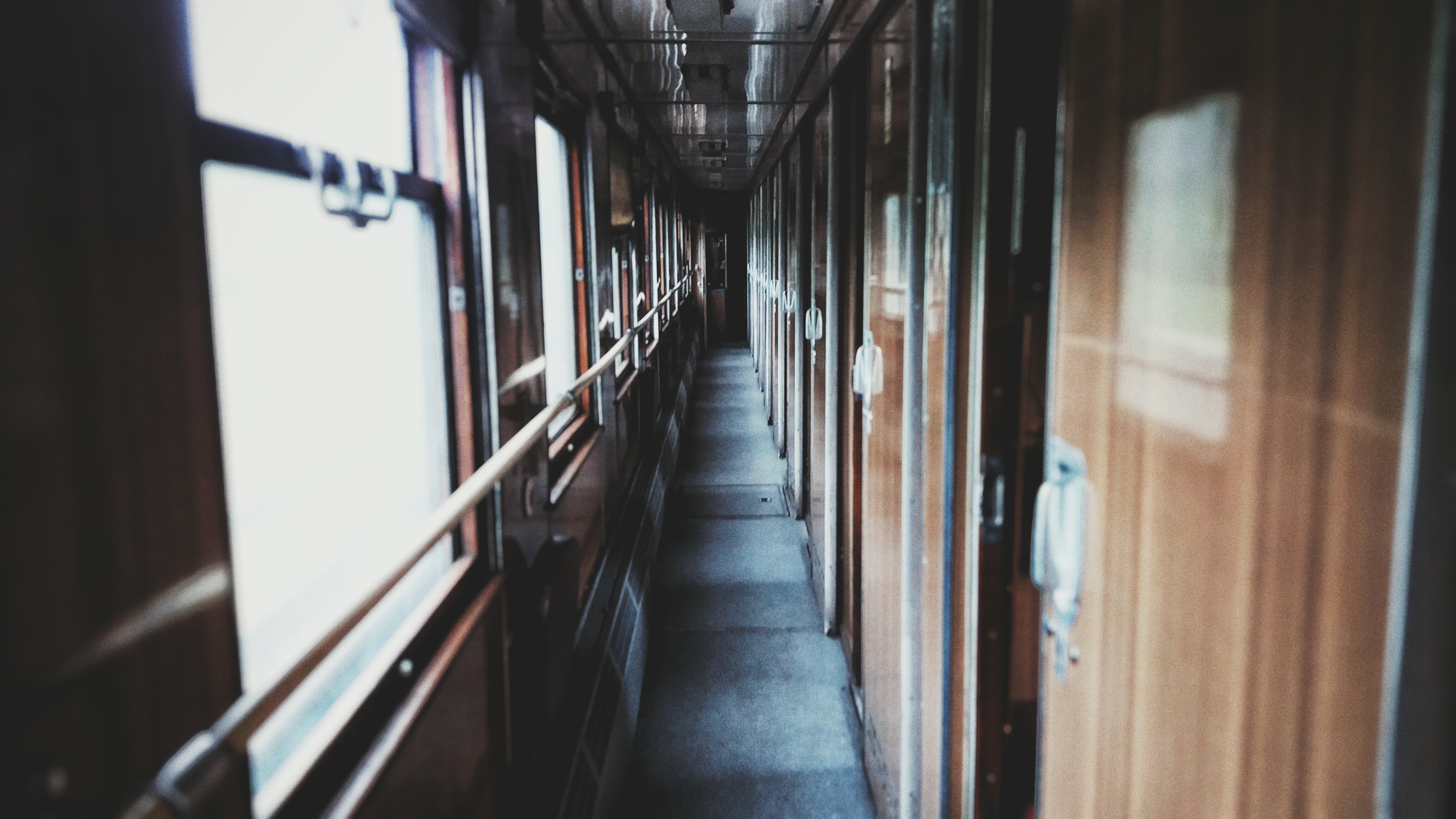 brown wooden framed train room doors