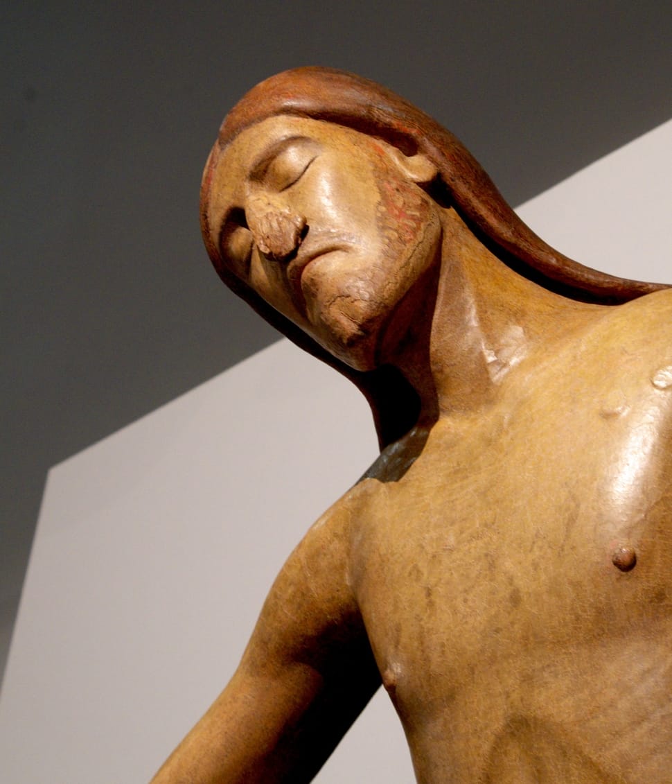 man brown wooden sculpture preview