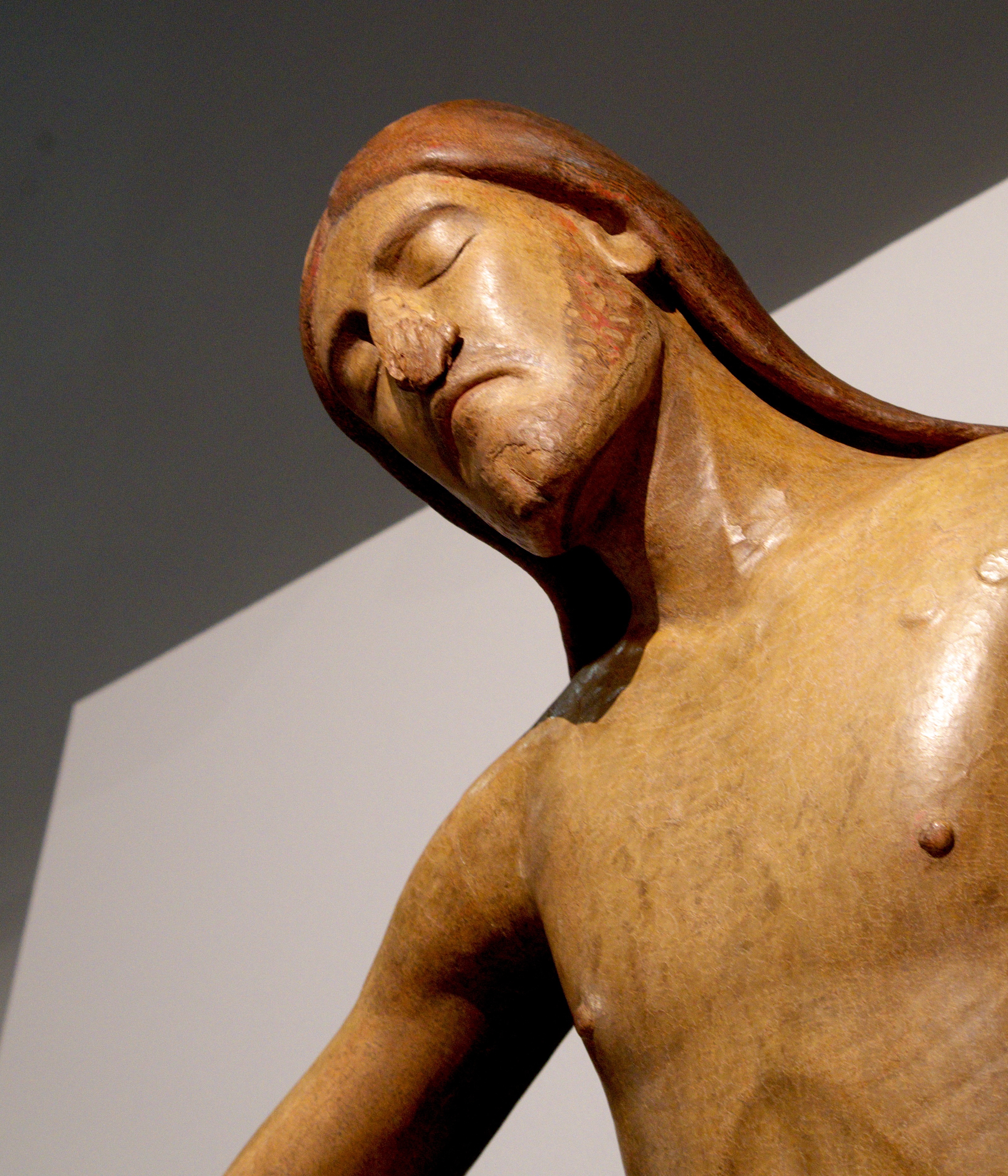 man brown wooden sculpture