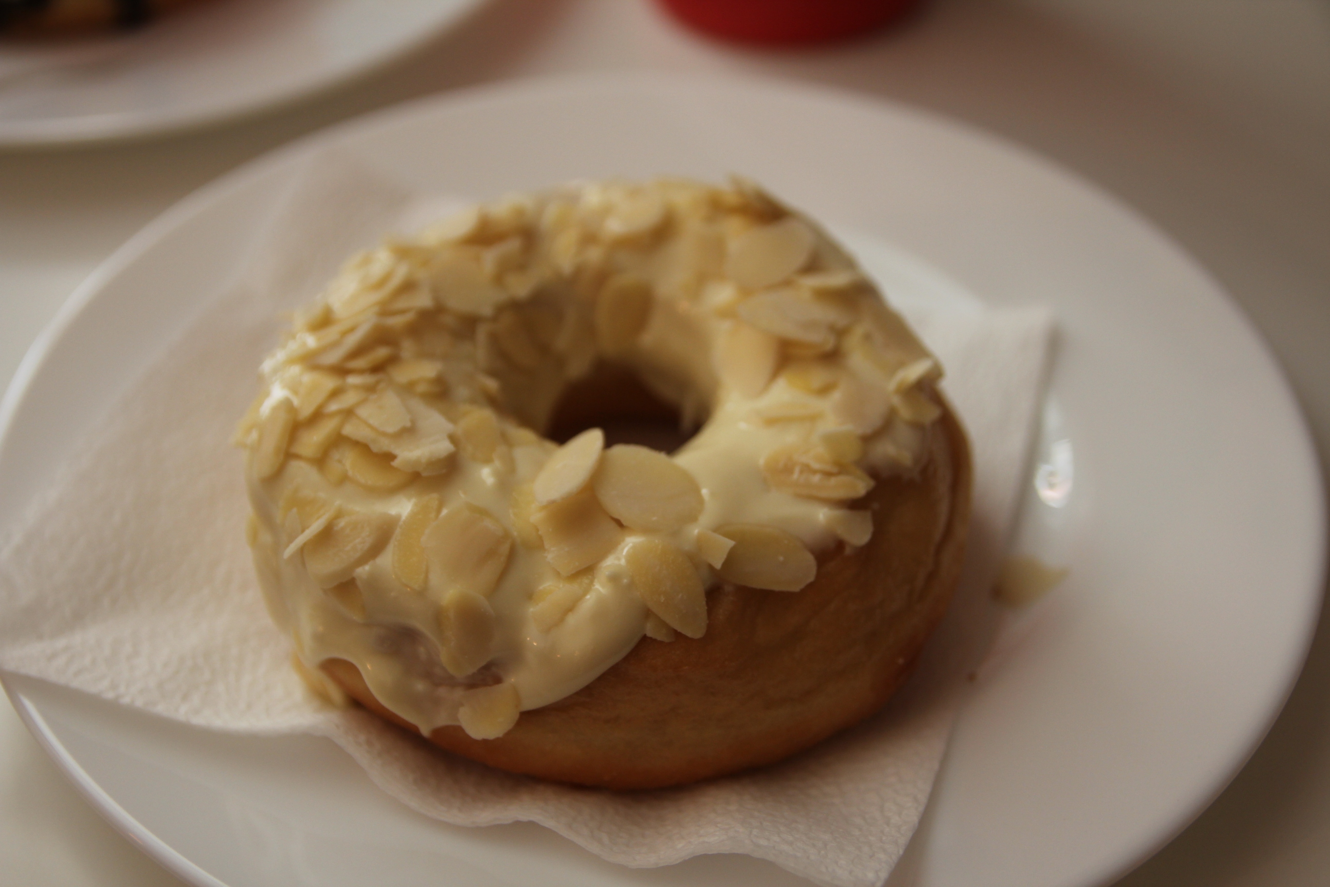 doughnut with cream on top