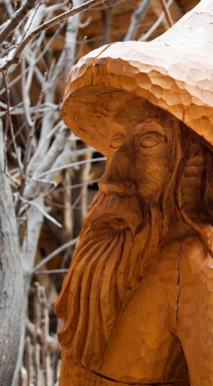 brown wooden dwarf statue thumbnail
