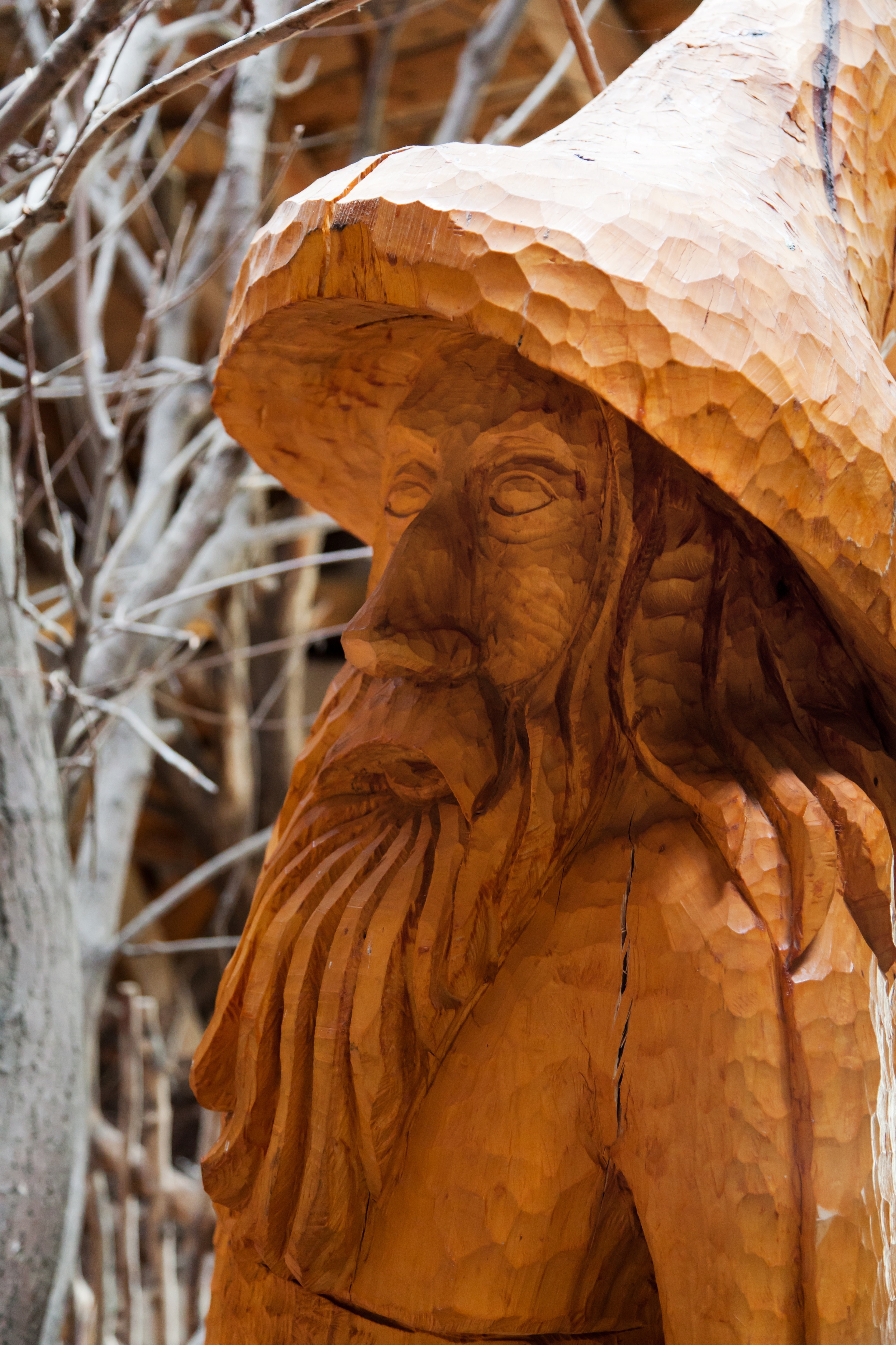 brown wooden dwarf statue