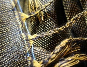 yellow and black knitted textile thumbnail