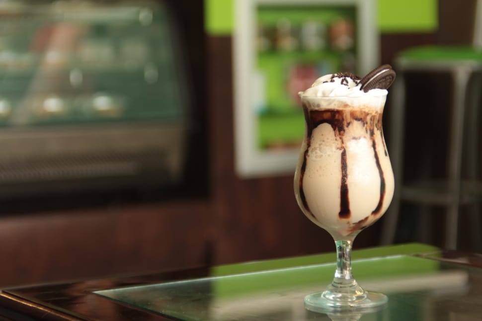 selective focus photography of cream with toppings cookie preview