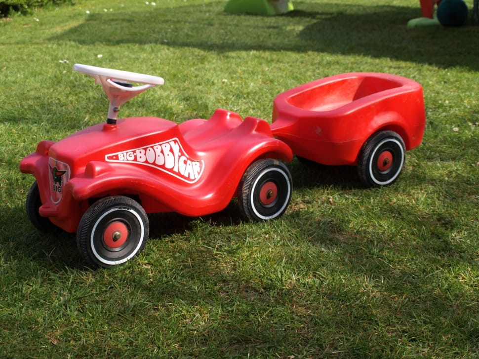 red ride on toy car with wagon preview