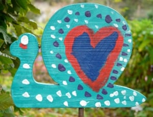 blue red and teal wall snail decor thumbnail