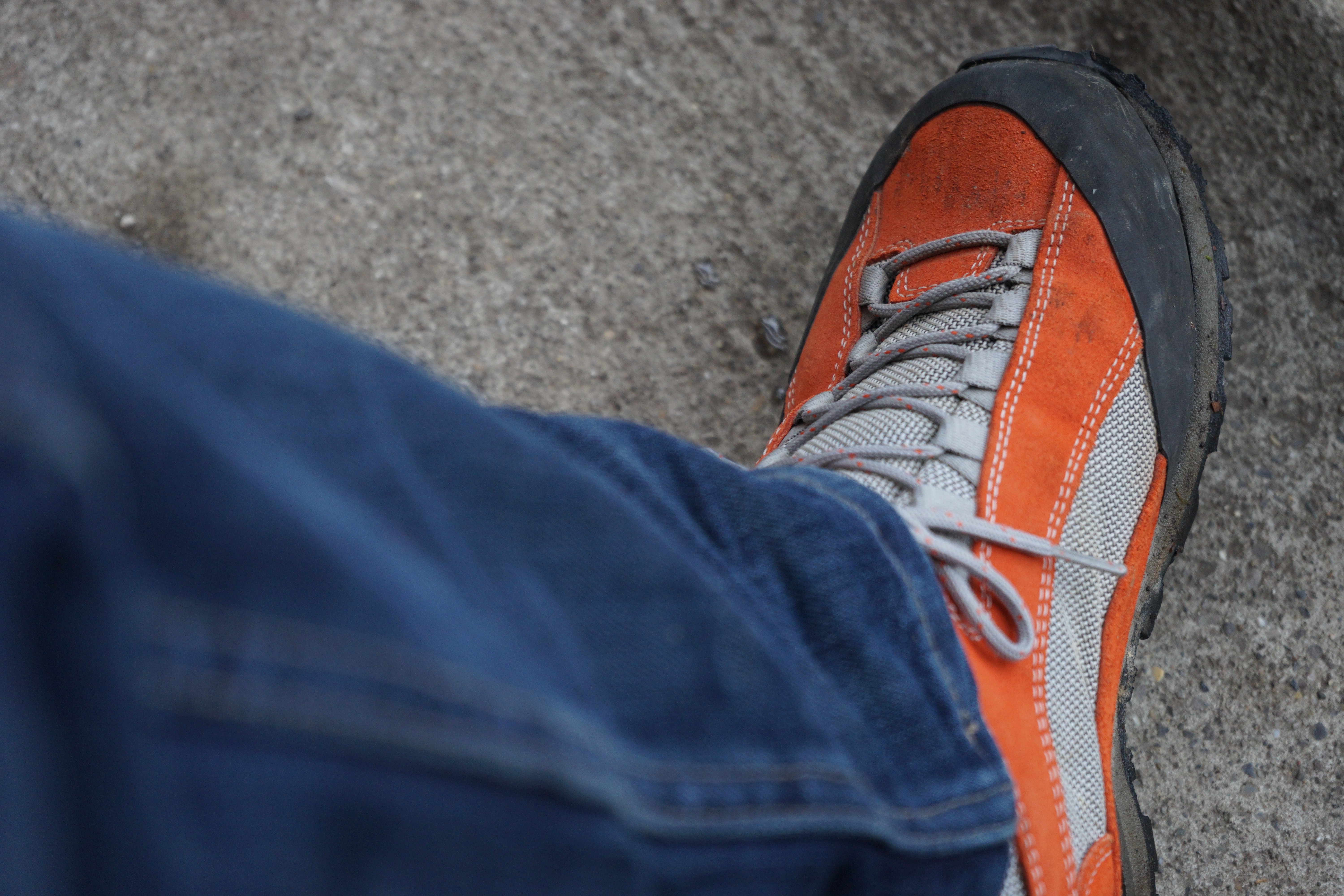 orange and grey low top sneakers