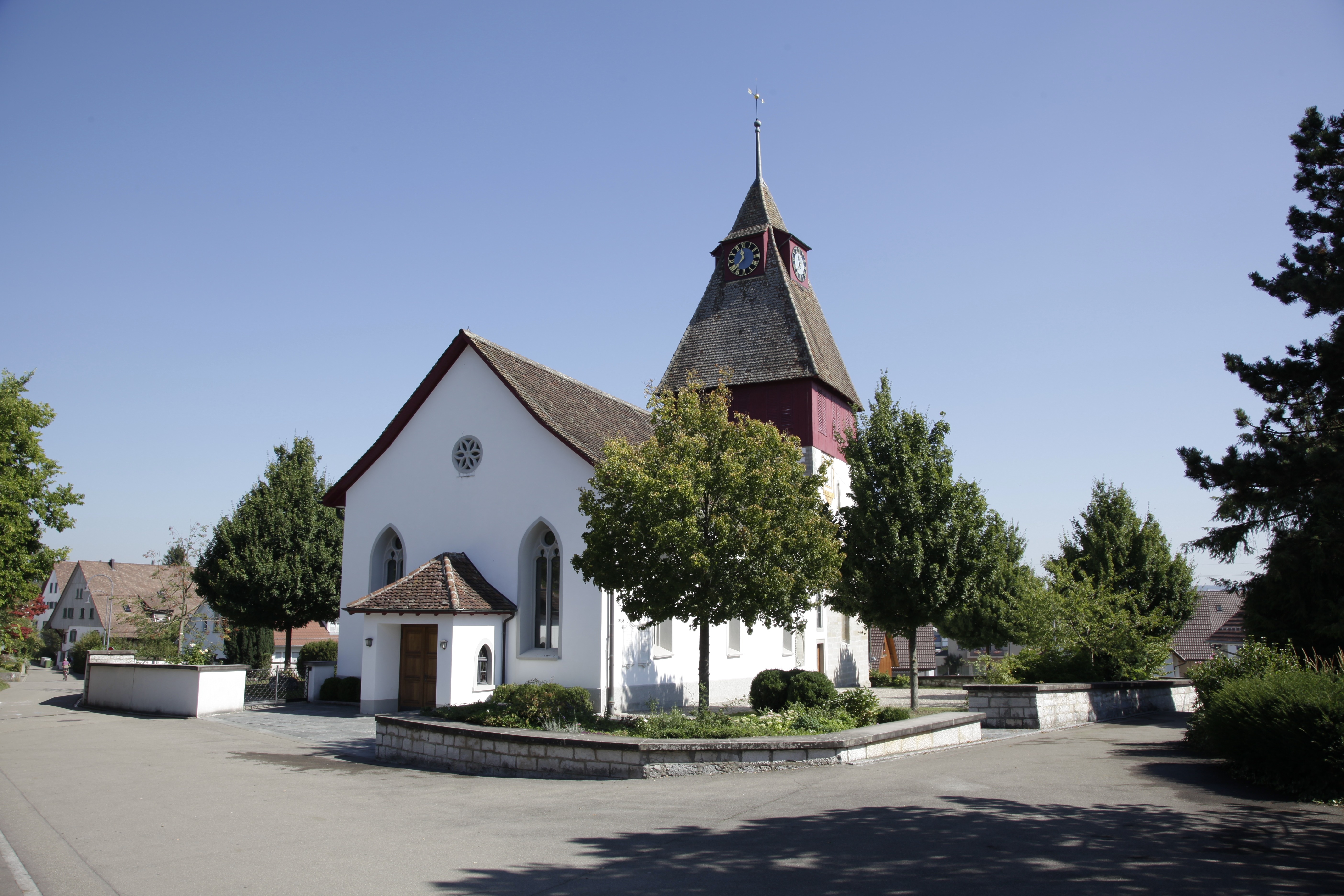 white and brown concrete chapel structure