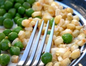 stainless steel fork, corn and peas thumbnail