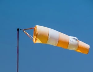 orange and white pole kite thumbnail