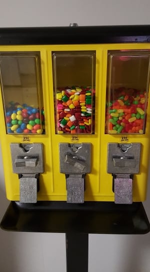 yellow and black candy dispenser thumbnail