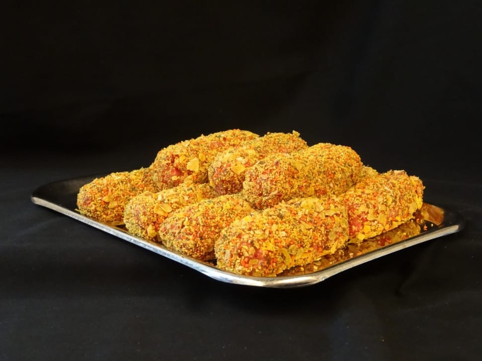 yellow bread rolled with bread crumbs preview