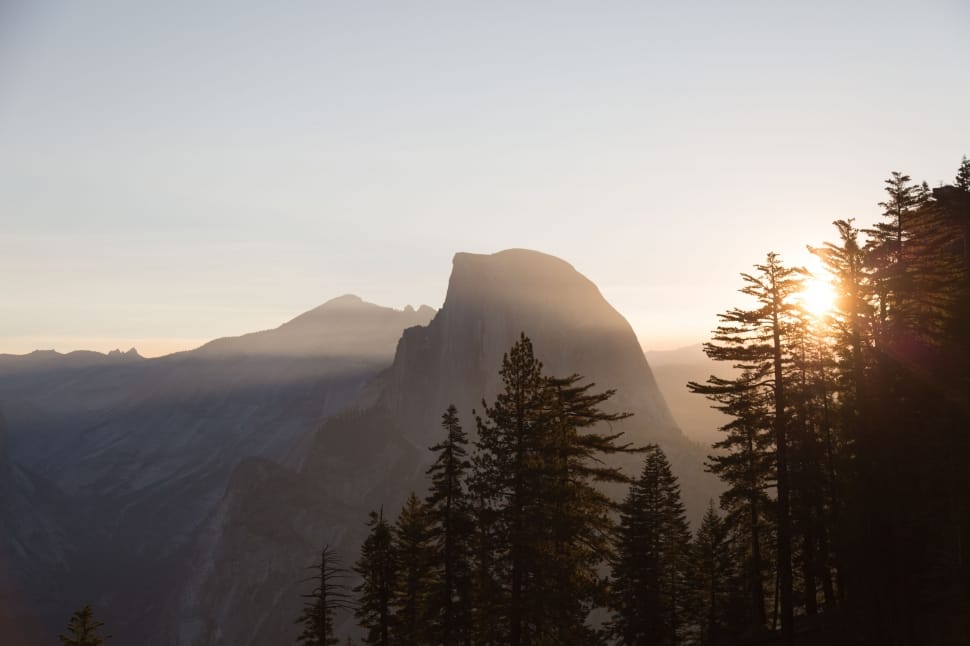 silhouette of mountain during daytime preview