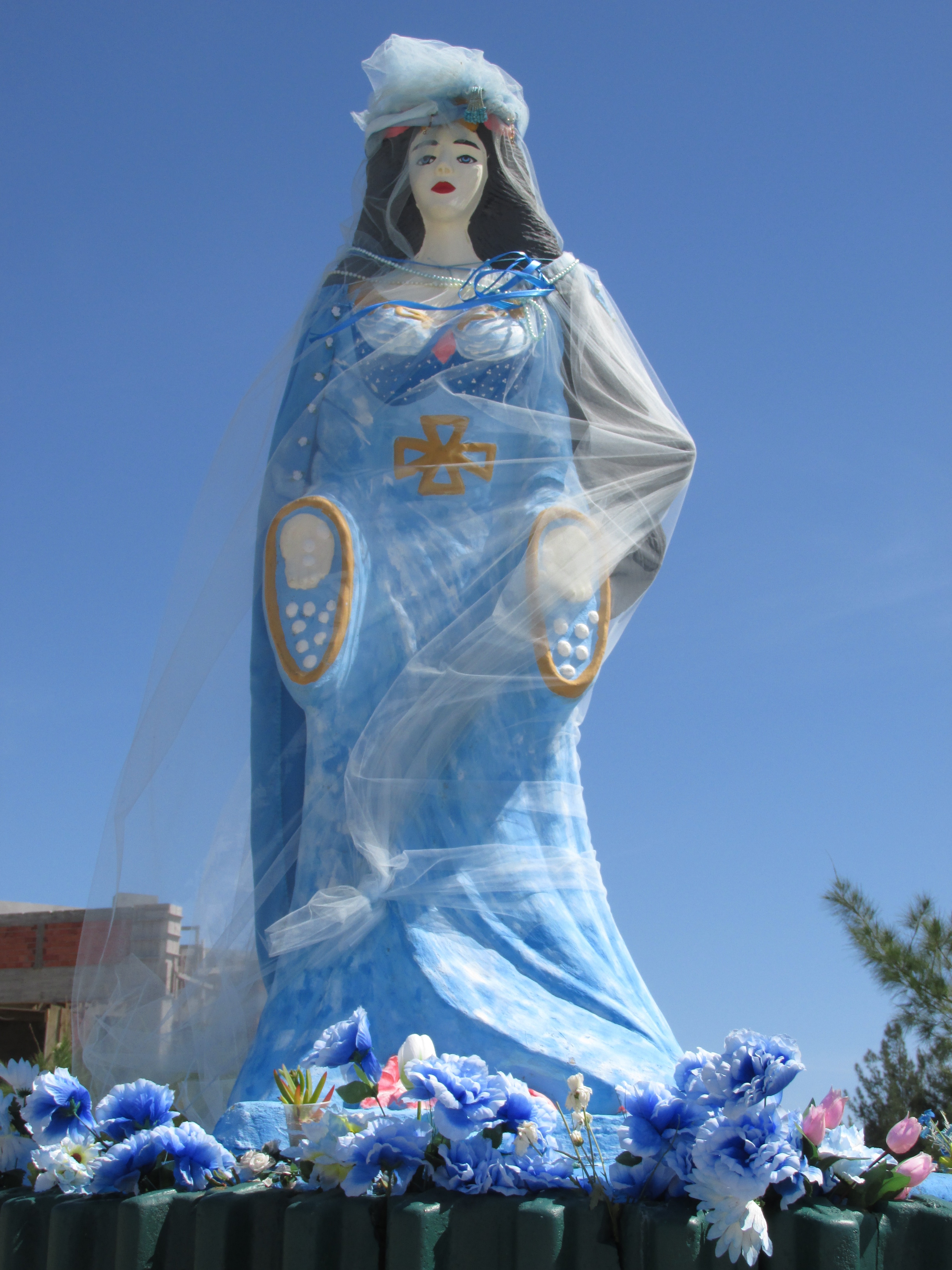 woman in blue dress statue