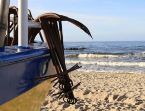 brown metal anchors near seashore thumbnail