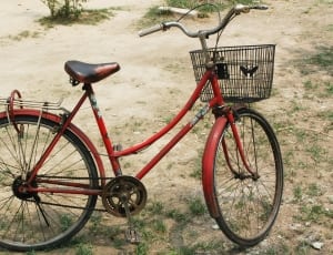 red cruiser bicycle thumbnail