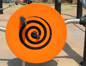 orange and black round board thumbnail