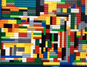 yellow red and white lego toy thumbnail