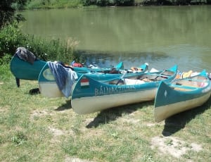 4 canoe boats thumbnail