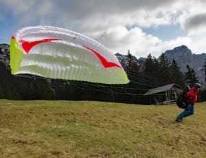 men's red shirt with white paraglider thumbnail