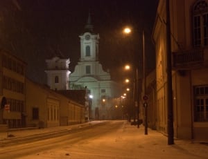white cathedral near open street during night time thumbnail