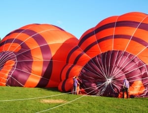 orange-and-maroon hot air balloon thumbnail