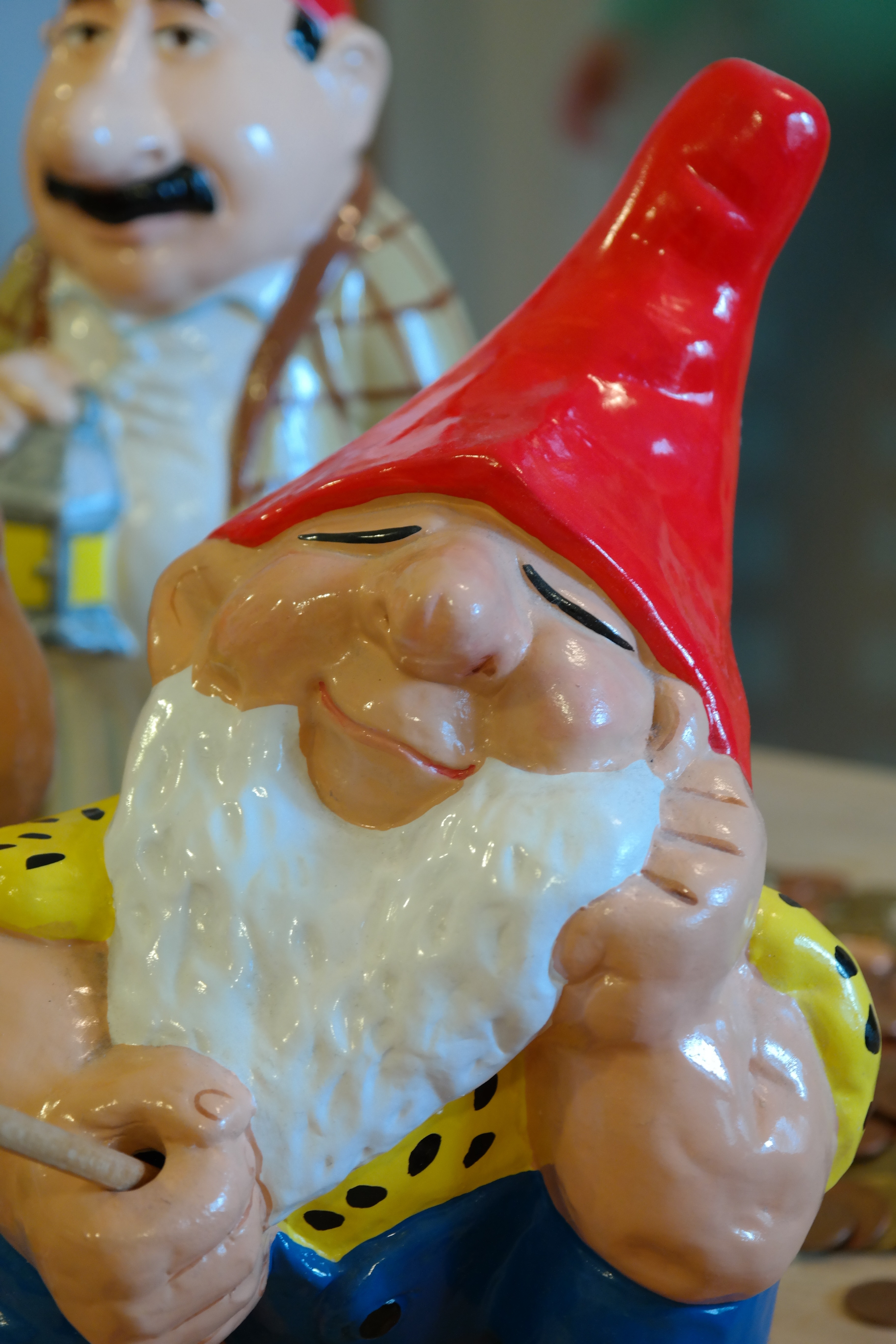 garden gnome wearing yellow shirt figurine