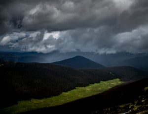 landscape photo of mountains with cloudy weather thumbnail