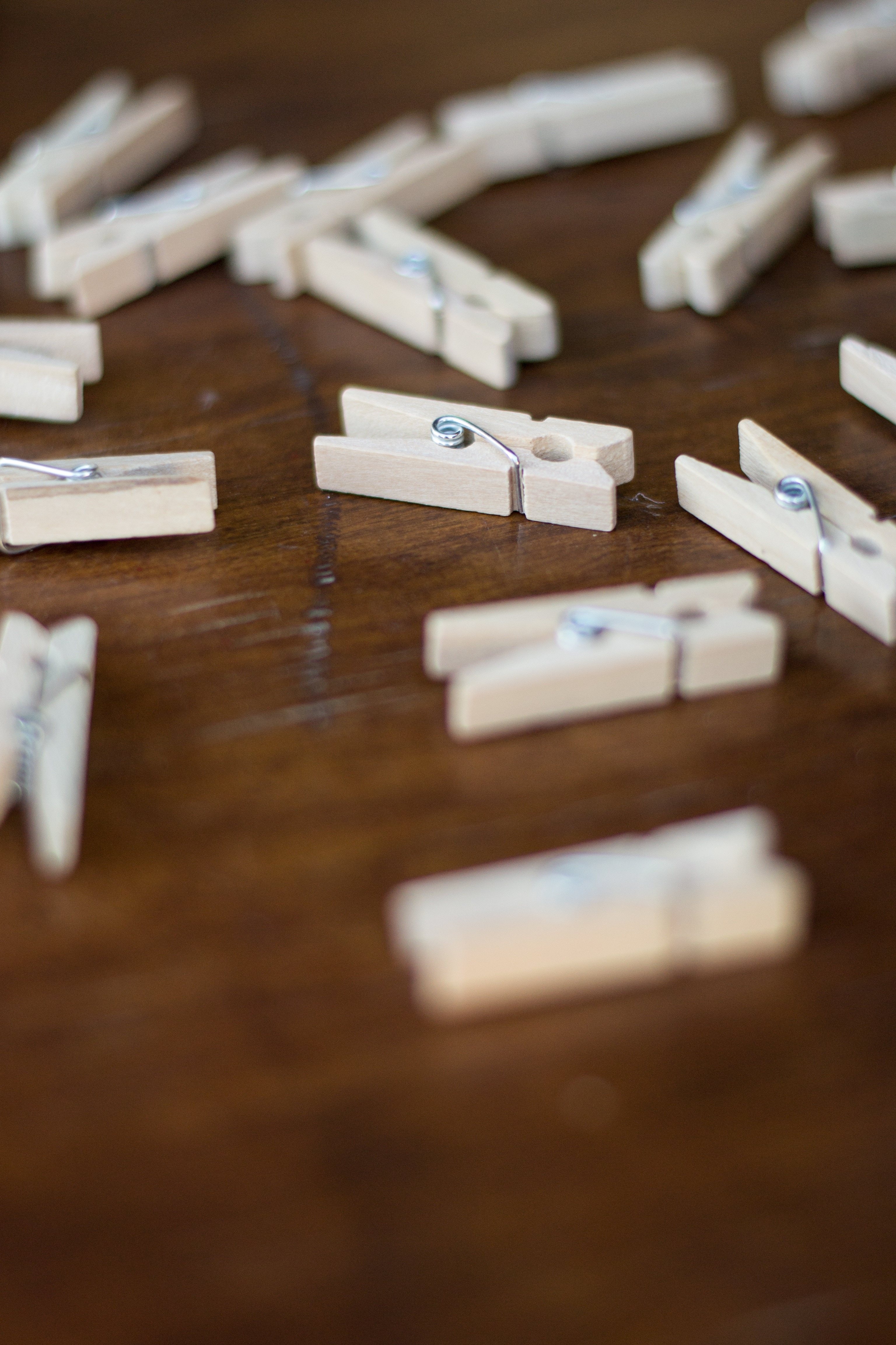 white wooden cloth clips