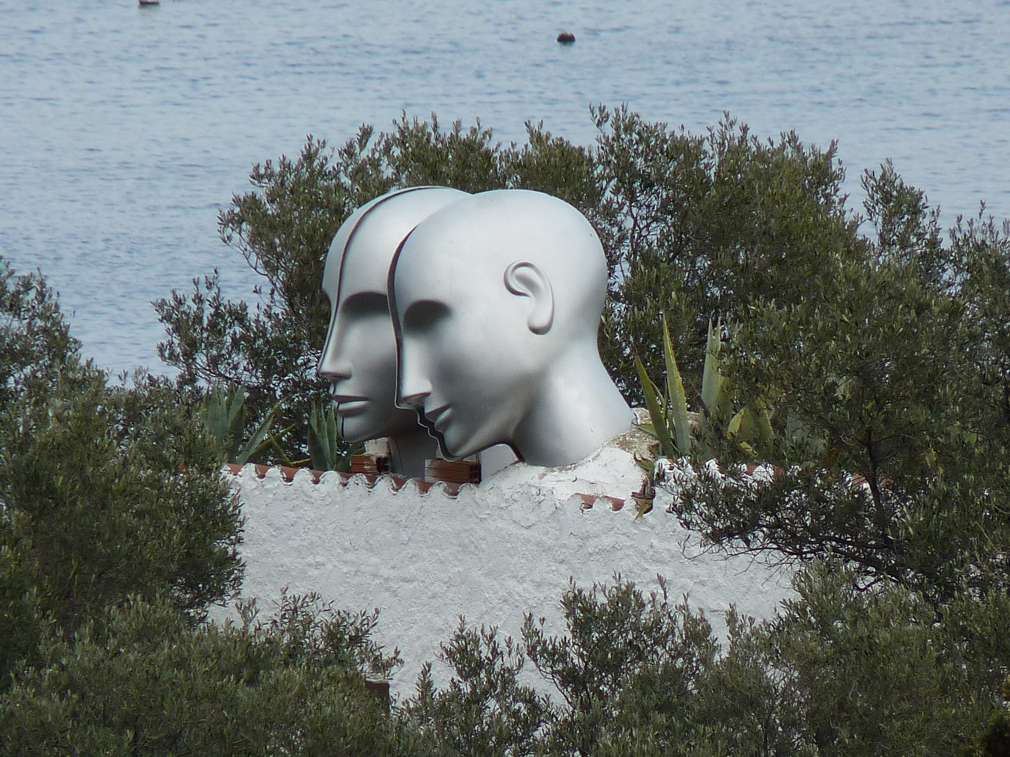stainless steel 2 human head sculpture