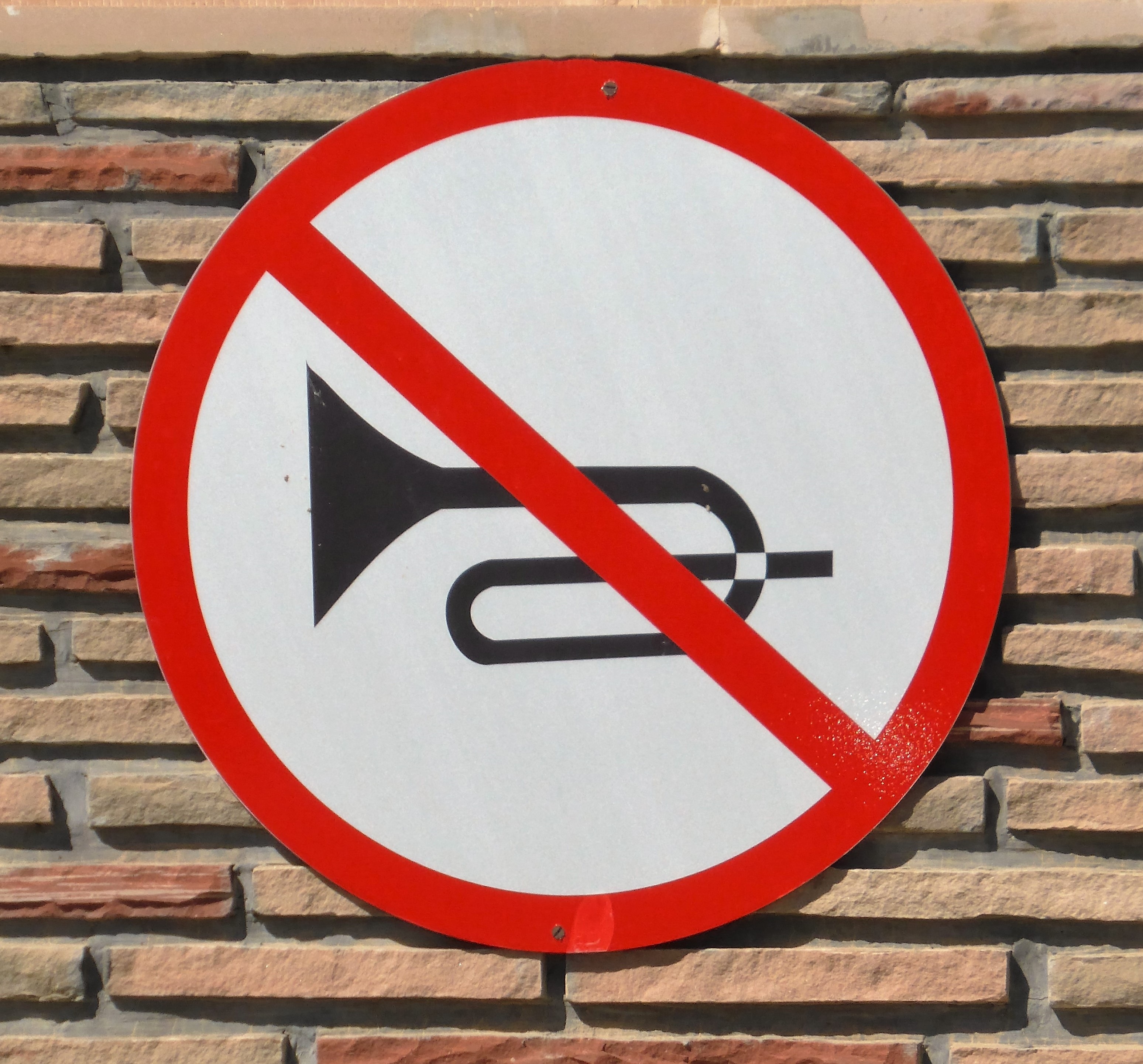 no musical instrument signage post