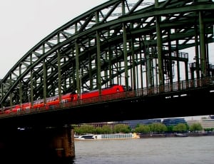 black metal bridge and red train thumbnail