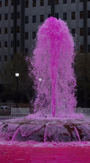 purple liquid coming out from fountain during daytime thumbnail