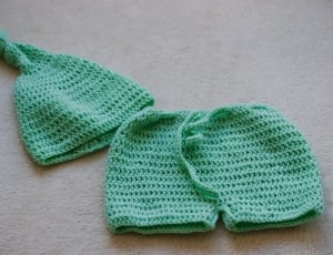 green crochet shorts and beanie thumbnail