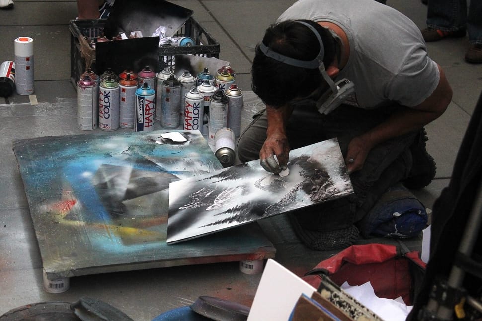 man doing spray paint preview