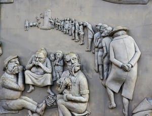 people grey wall  carved thumbnail