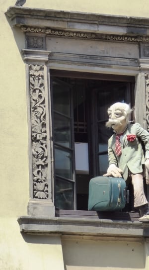 man holding luggage puppet thumbnail