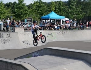 boy's red and black bmx bicycle thumbnail