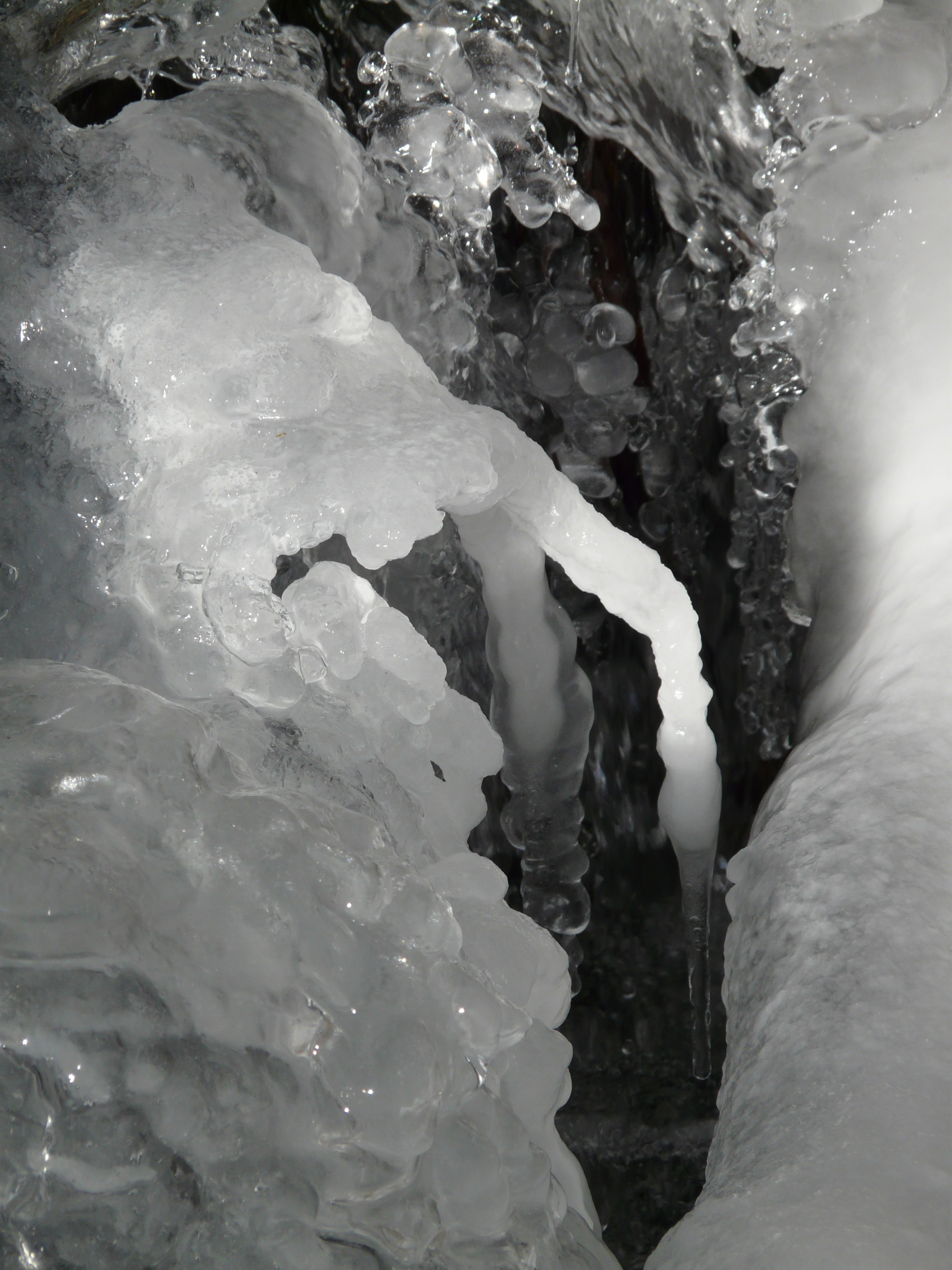 gray scale photo of ice