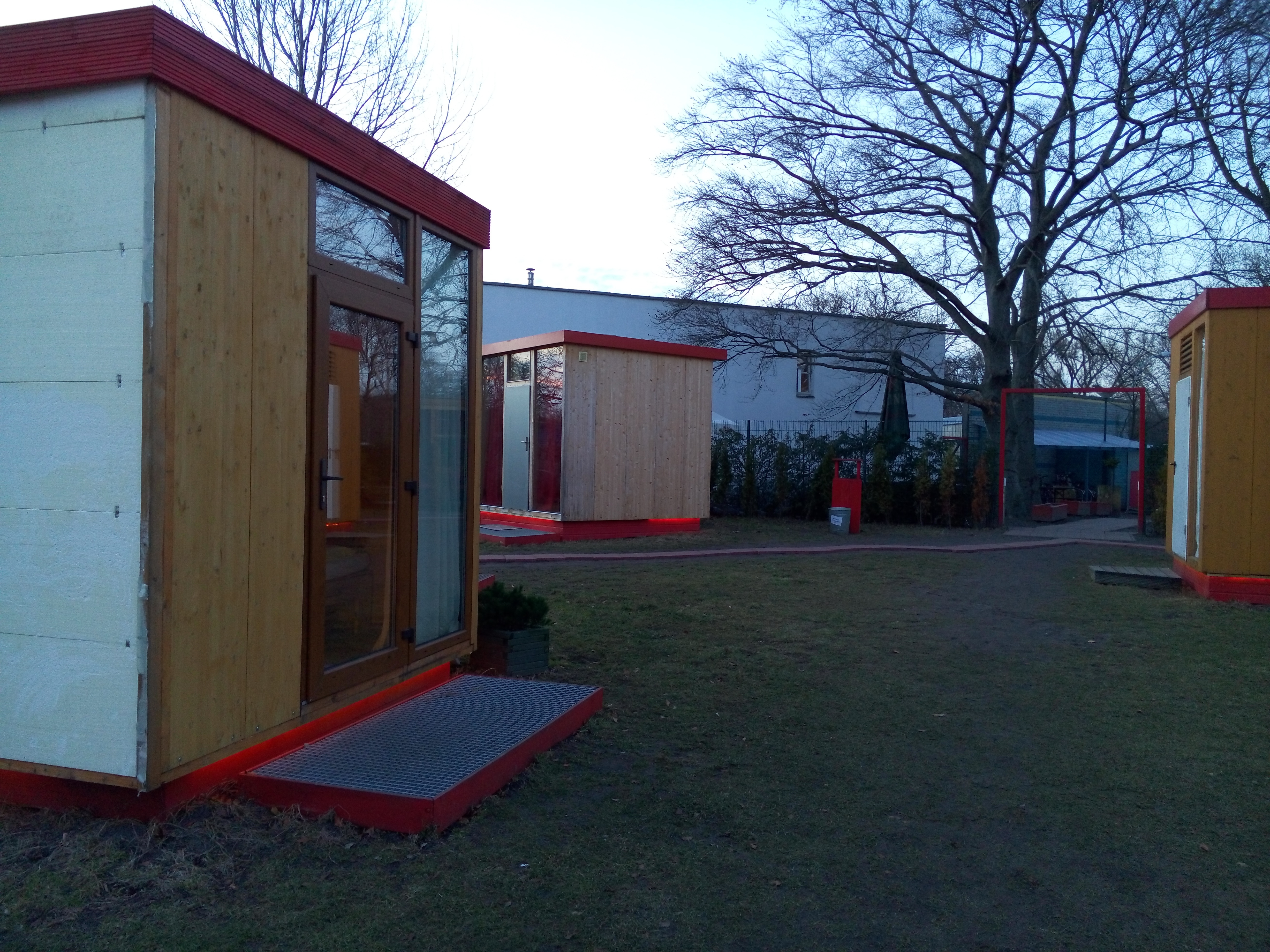 white red and brown wooden shed