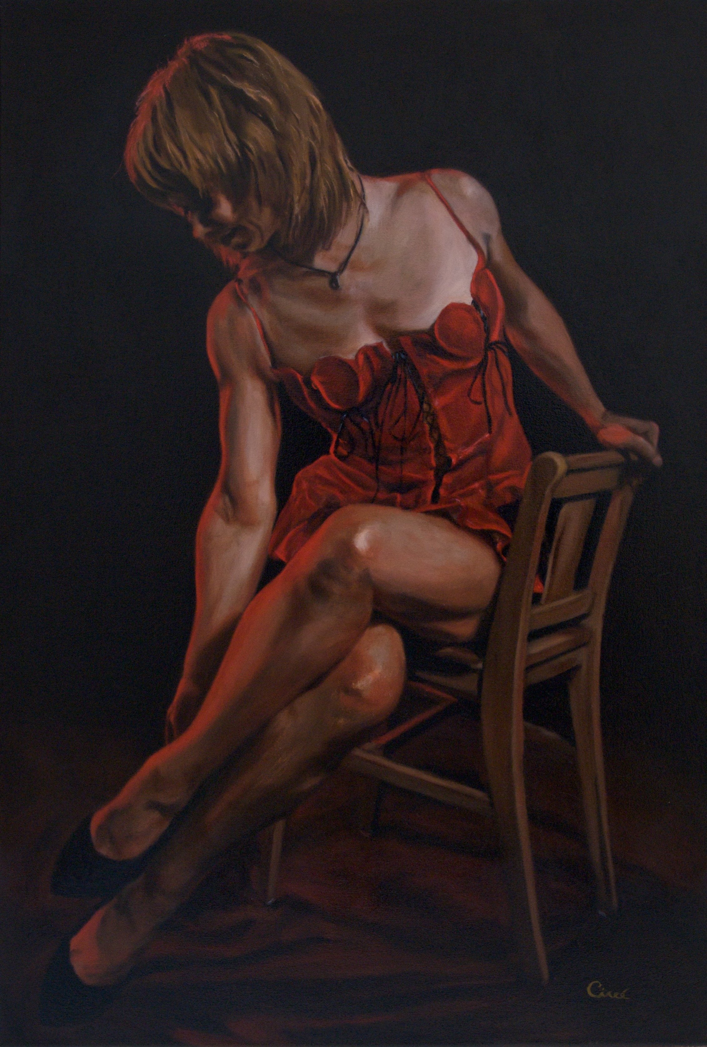 woman sitting on chair painting