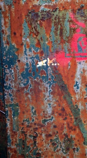 closeup photo of blue and brown metal panel thumbnail