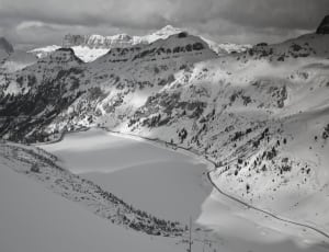 aerial view of snow covered mountains thumbnail