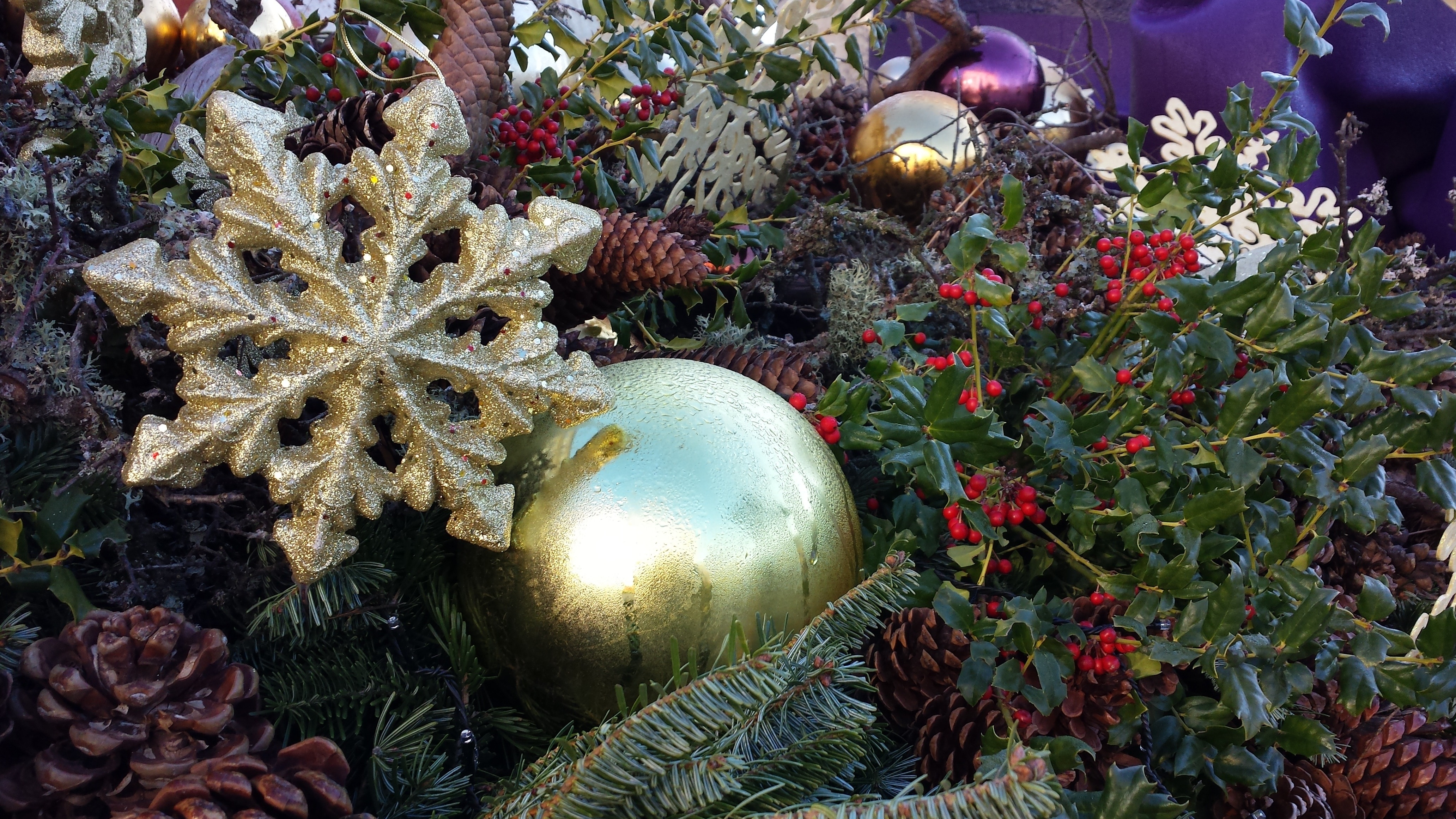 brass christmas bauble artificial mistletoe and pine cone