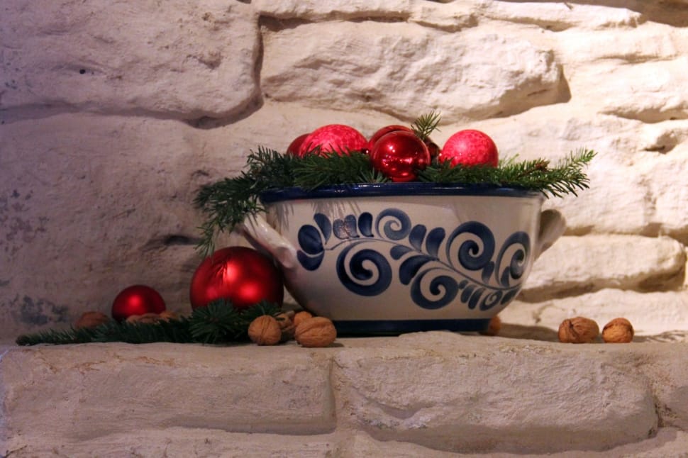 white and blue ceramic bowl with christmas baubles preview