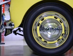 silver and yellow automotive rims thumbnail